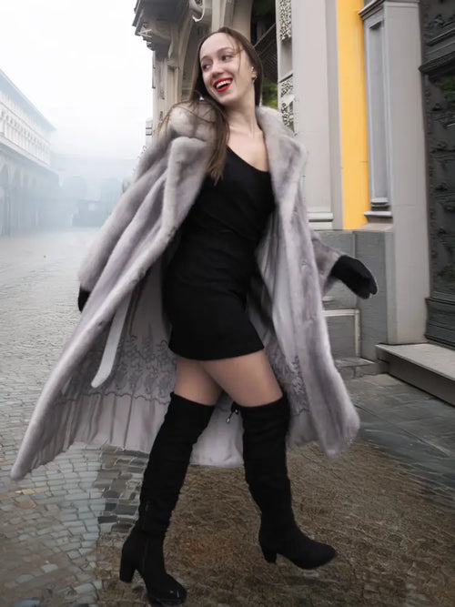 Light gray mink fur coat with flared silhouette, open front, long sleeves.