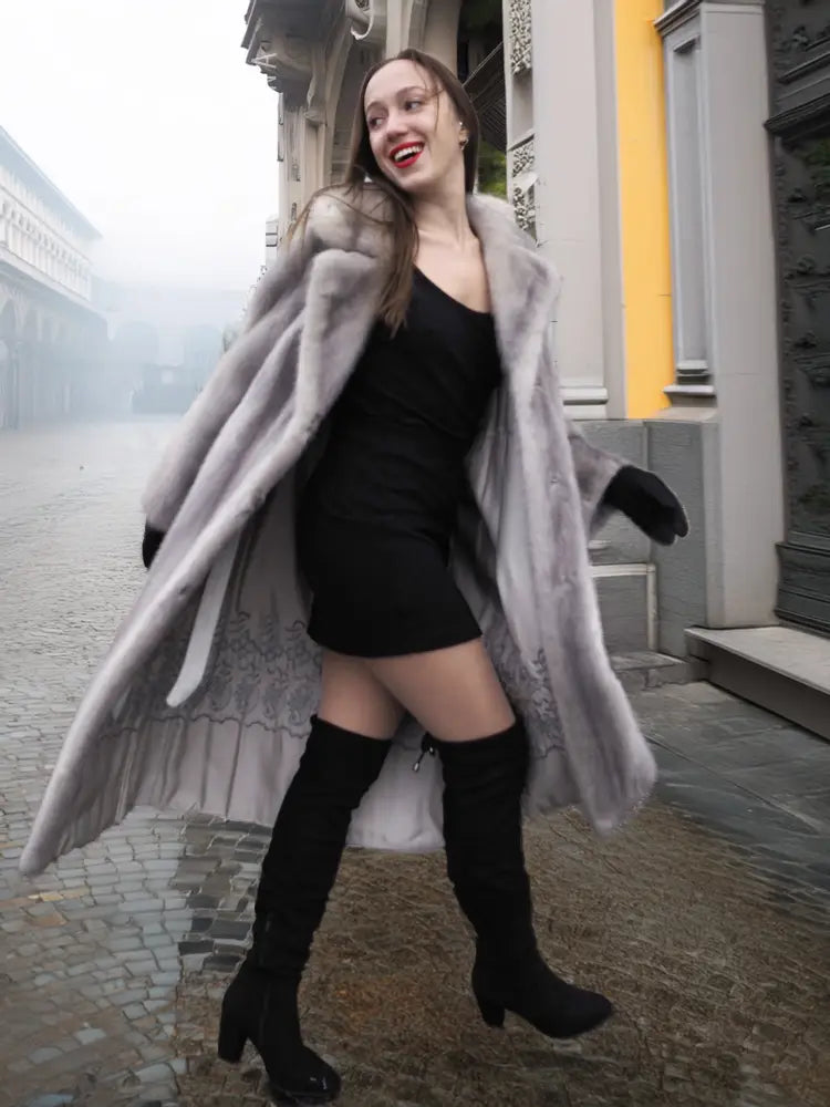 Light gray mink fur coat with flared silhouette, open front, long sleeves.