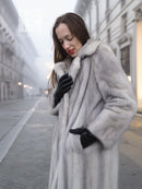 Light gray mink fur coat with plush texture, hooded collar, and open front.