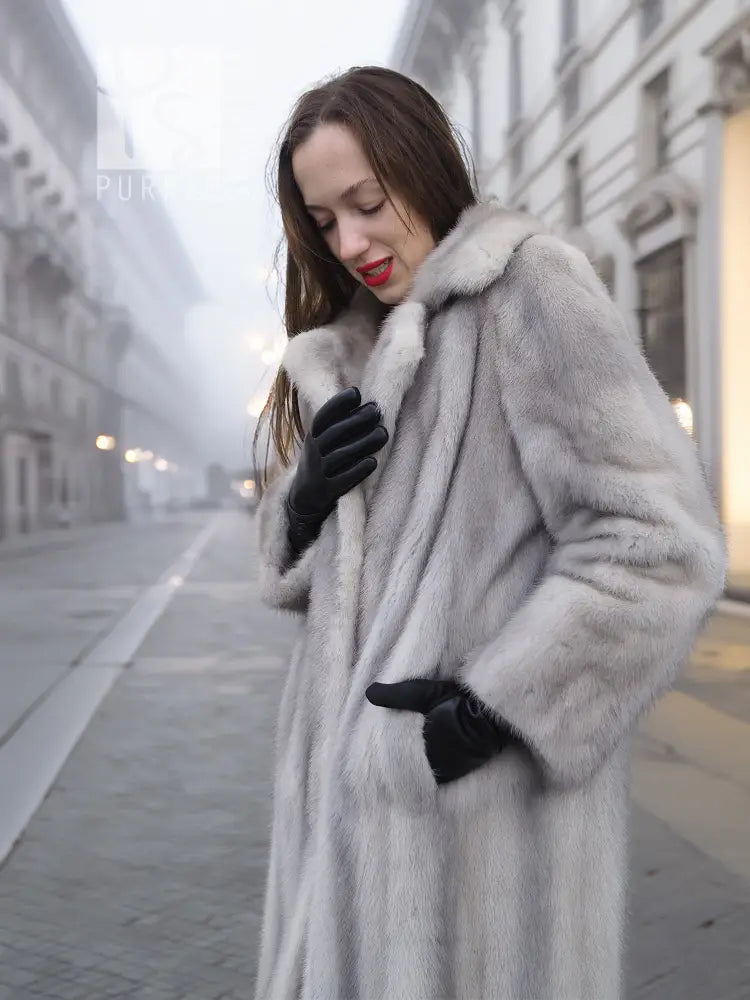 Light gray mink fur coat with plush texture, hooded collar, and open front.
