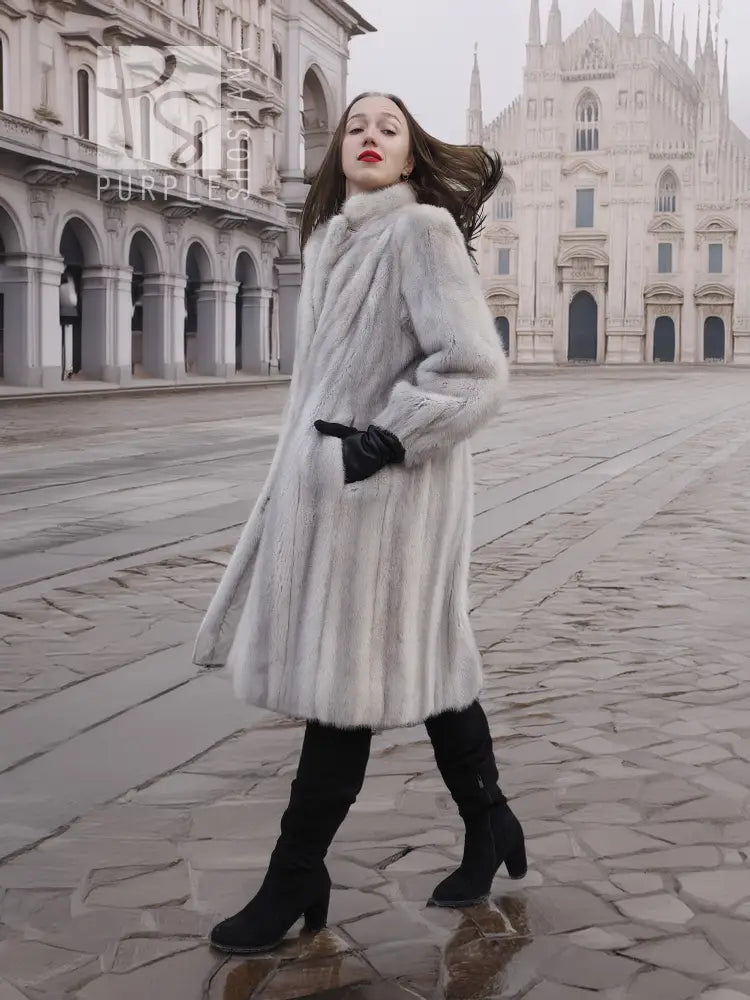 Light gray mink fur coat with stand collar, mid-thigh length, tied belt at waist