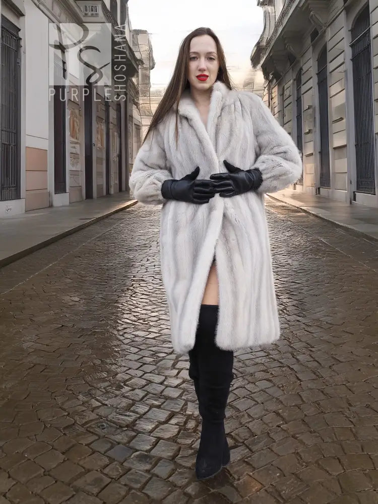 Light gray mink fur coat with stand collar and flared hem, front stance