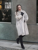 Light gray mink fur coat with wide collar and long sleeves, relaxed fit