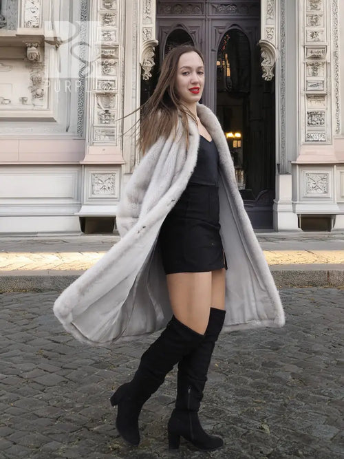 Light gray mink fur coat with open front, long sleeves, paired with black gloves