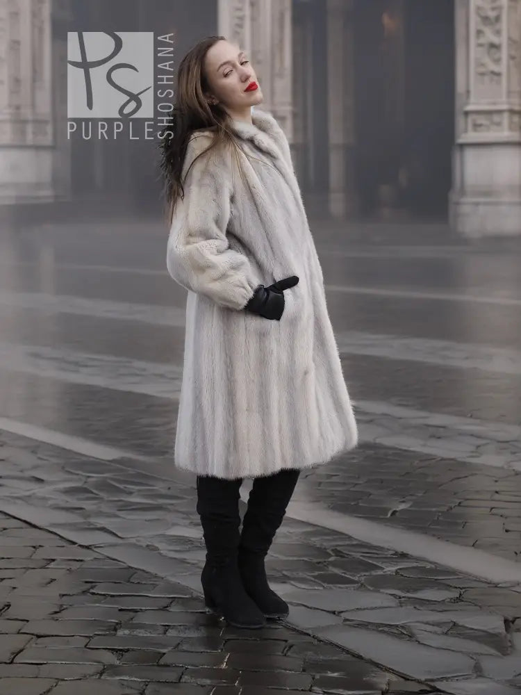 Light gray mink fur coat with stand collar and long sleeves, front angled view