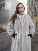 Light gray mink fur coat with stand collar and two-tone cuffed sleeves