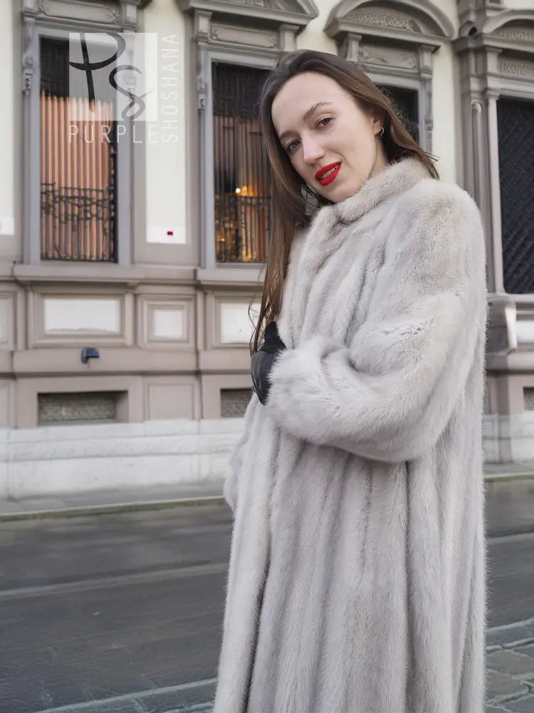 Light gray mink fur coat with stand collar, front view, long sleeves with dark cuffs
