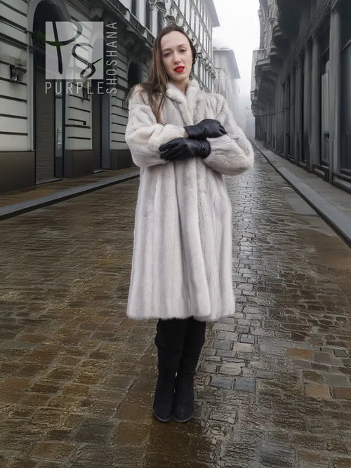 Light gray mink fur coat with full-length cut and stand collar