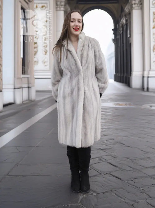 Light gray mink fur coat with stand collar and straight full-length silhouette