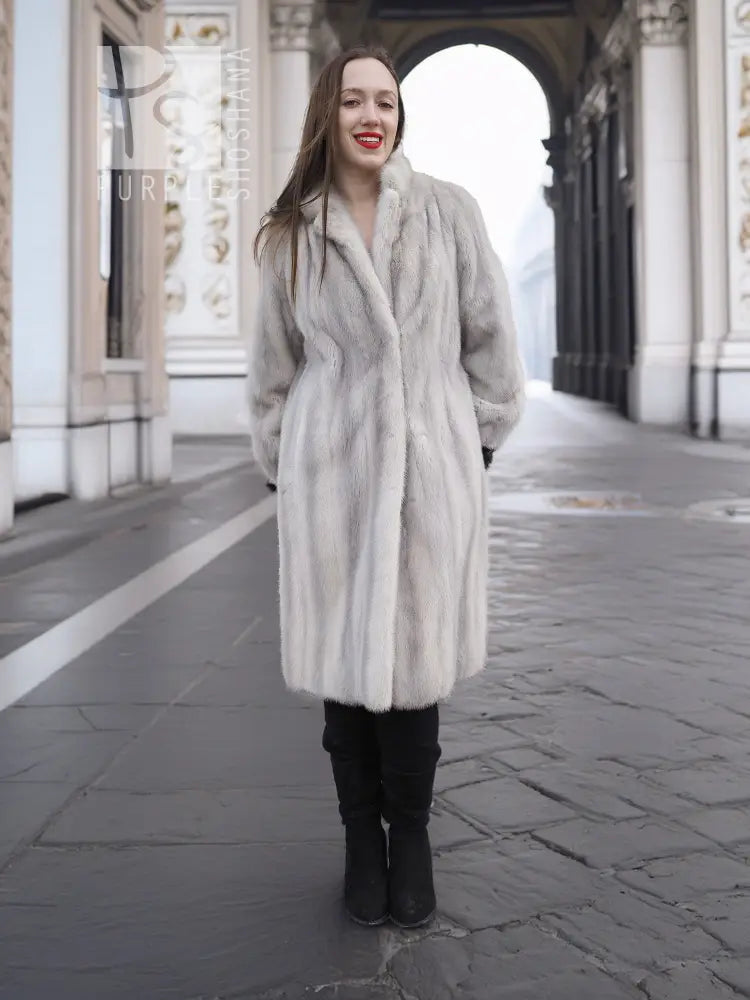 Light gray mink fur coat with stand collar and straight full-length silhouette