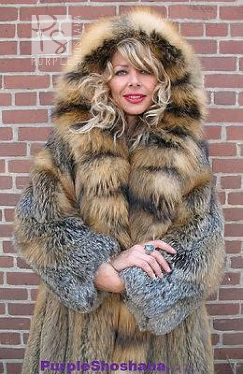 Hooded cross fox fur coat close-up, gray and tan striped panels, full sleeves