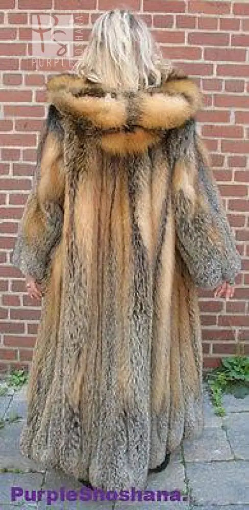 Back of hooded cross fox fur coat with fur hood and tan/brown stripe detail