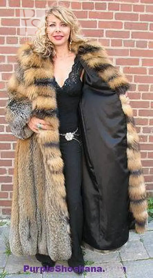 Hooded cross fox fur coat with black inner layer peeking, gray and tan striped panels