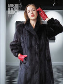 Vintage dark mink fur coat with wide collar, plush cuffs, red gloves.