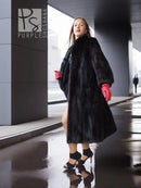 Black mink fur vintage coat, 3/4 view with red gloves