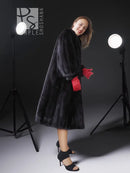 Black mink fur vintage coat, side view, wide sleeves and knee-length hem