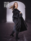 Black mink fur coat with rounded wide collar, side pose