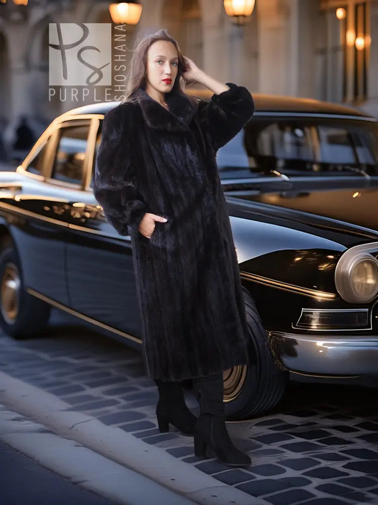 Black mink fur coat with wide collar and long sleeves, standing pose by car
