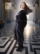 Long black mink fur coat with wide collar; full-length side profile.
