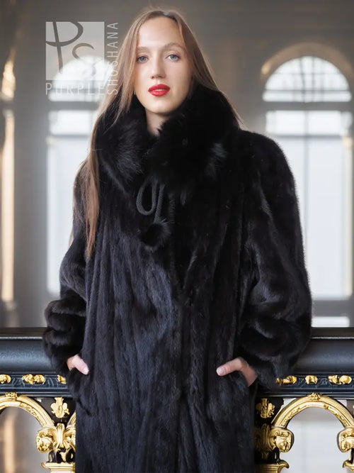 Black mink fur coat with fox fur collar, chest-up portrait