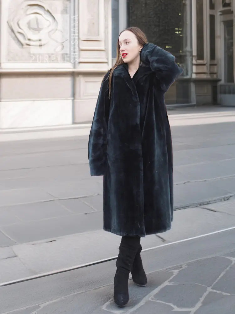 Mink fur coat, dark color, long coat with vertical seam detailing and raised collar
