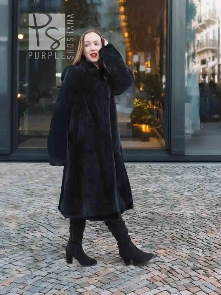 Dark mink fur coat with button-front and stand collar, full-body side view.