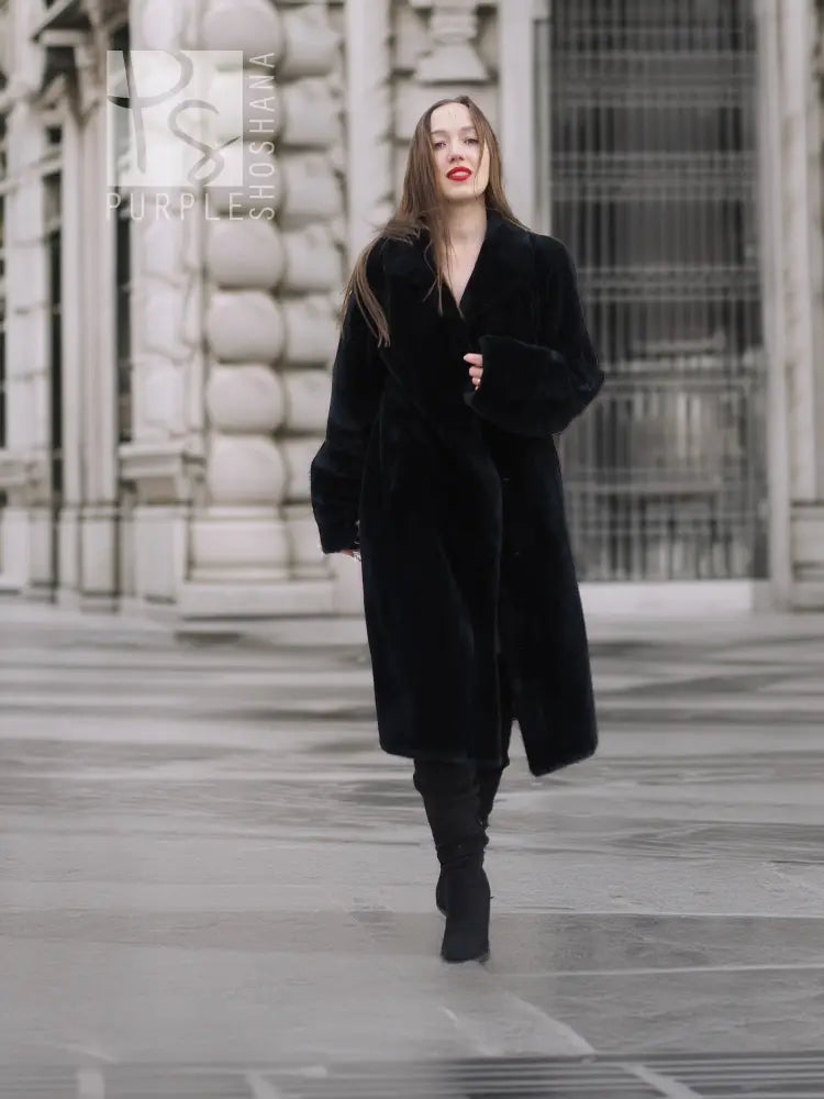 Black mink fur coat with V-neck, button front, long sleeves, and knee-length cut.