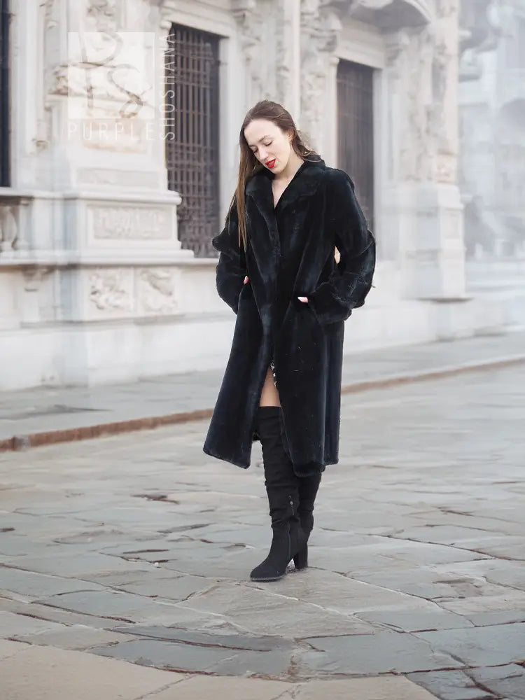 Mink fur coat, dark color, front view with open waist and long sleeves