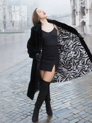 Mink fur coat, dark color, open front with zebra-print lining and long sleeves