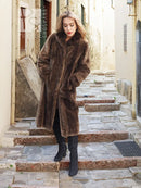 Long sheared beaver fur coat in dark brown with buttonless front and plush sleeves