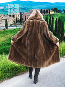 Back view of dark brown hooded fur coat, full length, swaying hem