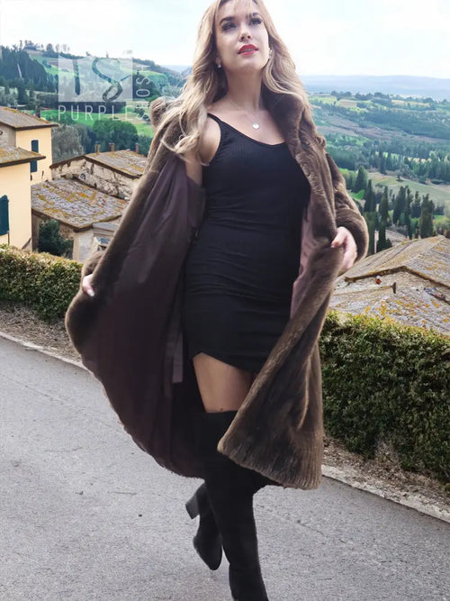 Dark brown full-length fur coat with hooded collar and open front