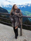 Long fur coat with thick textured shoulders and open front, dark gray