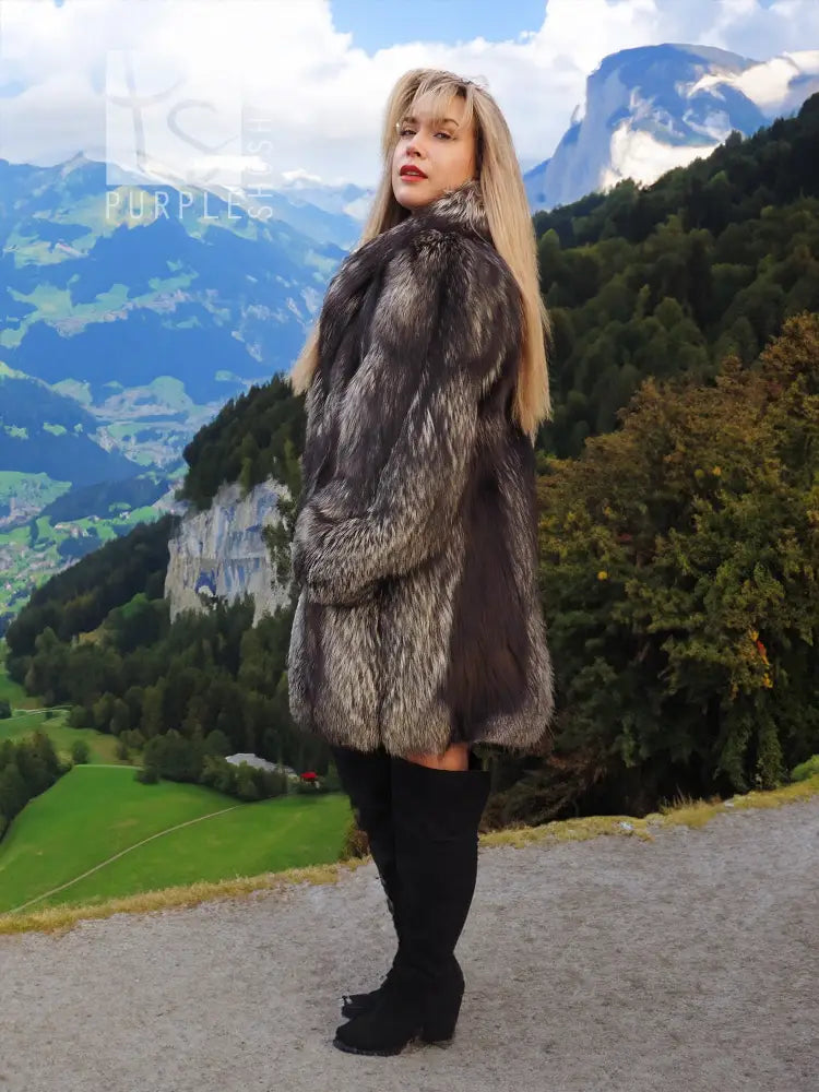 Long dark gray fur coat with textured collar and straight hem