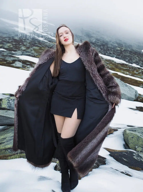 Hooded dark brown fur coat with wide collar and layered front panels.