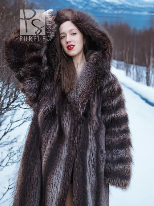 Hooded dark brown fur coat with voluminous collar, close-up at shoulders and hood.