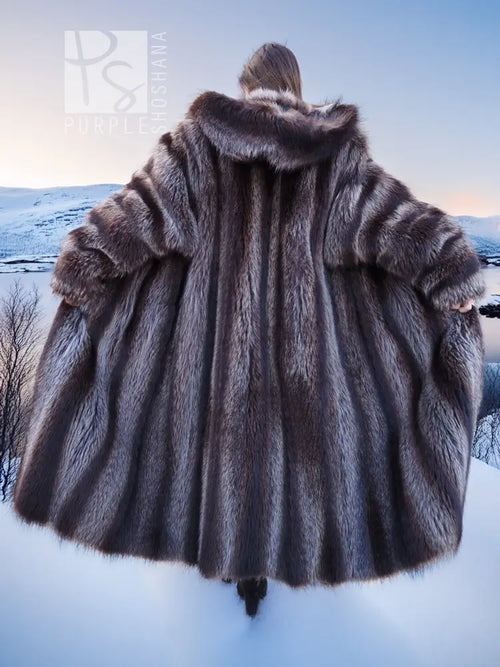 Back view of long dark brown hooded fur coat with raised hood and flared shoulders.