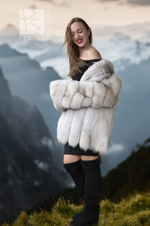 Light white fox fur jacket with open front and chunky horizontal fur bands