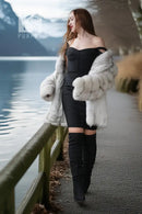 Light white fox fur jacket with open front and rounded sleeve shapes