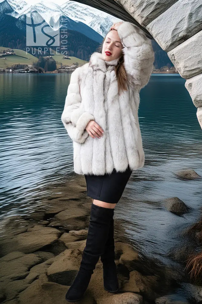 Light white fox fur jacket with open front and layered, textured fur cuffs