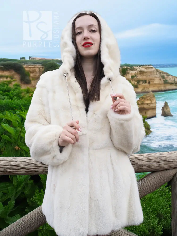 Women’s hooded mink fur coat, light cream, front view with hood up