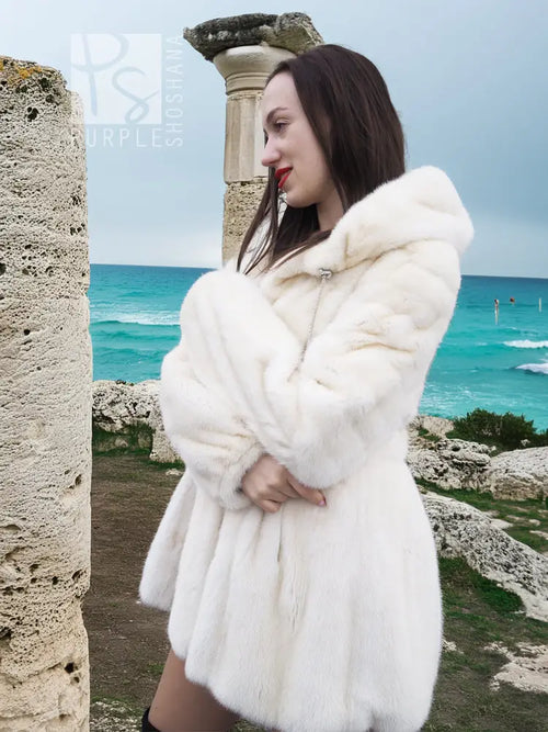 Women’s mink fur hooded coat, light beige, 3/4 side view with layered hood design