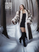Long raccoon fur coat with white and dark stripes, fox-trim collar and cuffs, open front
