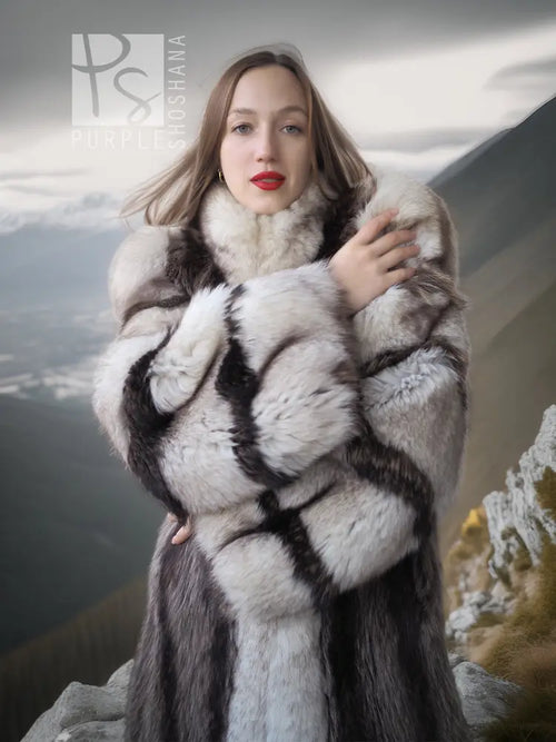 Close-up of long striped fur coat with fox-trim collar, dark and white bands