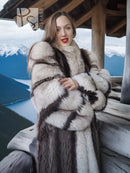 Full-length raccoon fur coat with fox trim, wide fur collar, and black-and-white stripes