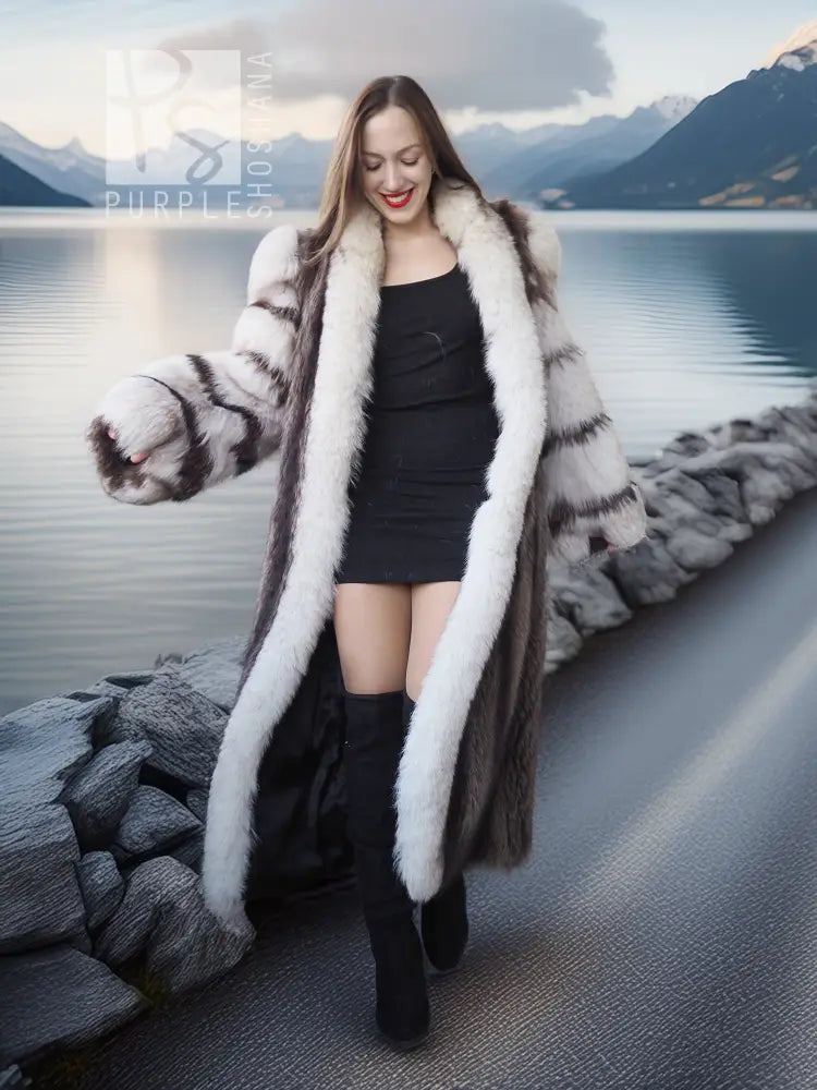 Full-length fur coat with striped white-and-dark fur, open front and draped sleeves