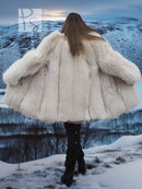 Cream plush fur jacket, back view with wide sleeves