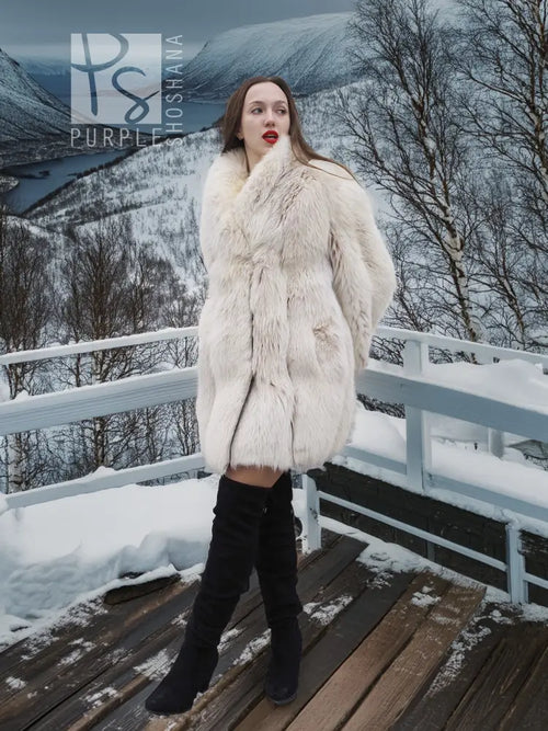 Soft plush fur jacket with full sleeves, straight hem, and side pocket openings.
