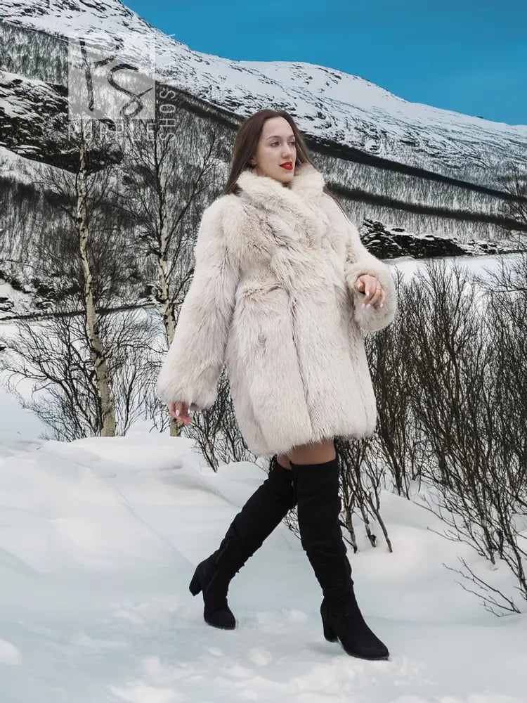 Soft plush fur jacket with relaxed fit, long sleeves, and side pockets.