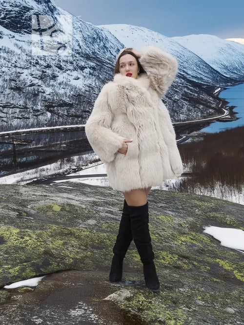 Soft plush fur jacket with wide collar, long sleeves, and straight hem.